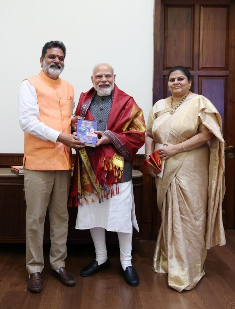 Dr. Vakulabharanam Krishna Mohan with PM Narendra Modi