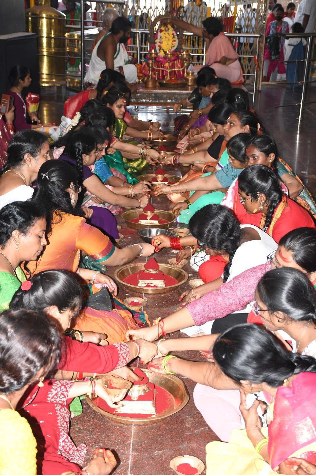 Devotees performing puja